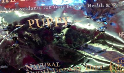 You can see holes near "Puppy" on the bag :(